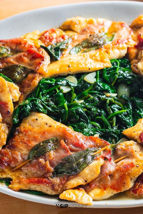 Chicken saltimbocca combines thinly sliced pan seared cutlets layered with sliced prosciutto and sage and simmered in a buttery white wine sauce. Serve alongside garlicky sauteed spinach. #chickenrecipes #chickensaltimbocca #italianrecipes Chicken Saltimbocca Recipe Giada, Dinner Recipes With Sage, Chicken Saltimbocca Sides, Gourmet Italian Dinner, Chicken Saltimbocca Recipe Prosciutto, Chicken Pancetta Recipes, Chicken Prosciutto Recipes, Chicken Scallopini Recipes, Saltimbocca Chicken