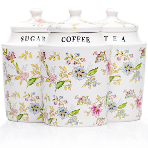 PRICES MAY VARY. Brings a Calming Presence to the Home: These 3.7” small air tight jars not only provide a place for you to neatly store three of the most common kitchen items, but the aesthetically pleasing flower design has a magical way of inviting tranquility into any space Store Those Daily Brews and Sugar in Style: Included are three 13.5-ounce ceramic canisters with lids; These ceramic kitchen canisters have Coffee, Tea, and Sugar beautifully printed below each lid, making them a great ad Tea Coffee Sugar Jars, Flower Kitchen, Ceramic Kitchen Canisters, Pantry Jars, Ceramic Canister Set, Ceramic Canisters, Kitchen Canister Set, Coffee Jars, Sugar Canister