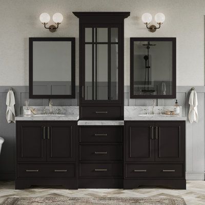 Make bathroom storage look glamorous with the Peighten vanity set series from ARIEL. The Peighten series includes white quartz countertops mounted above solid wood cabinets finished with satin nickel finish hardware. The matching framed mirrors accompanying this series round out the contemporary design for a complete look. Base Finish: Espresso Brown | Winston Porter Peighten 85" Double Bathroom Vanity Set w / Mirror Wood / Marble in Brown | 89 H x 85 W x 22 D in | Wayfair Framed Mirrors, Solid Wood Cabinets, Vanity Set With Mirror, Double Sink Vanity, White Quartz Countertop, White Marble Countertops, Double Sink Bathroom, Double Sink Bathroom Vanity, Double Bathroom