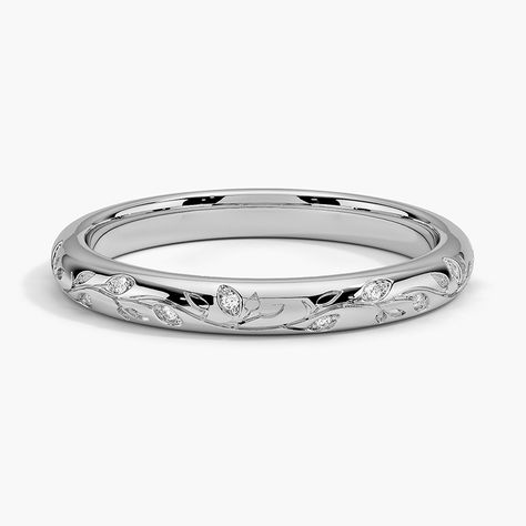 Verdure Engraved Diamond Wedding Ring - 18K White Gold. Diamonds adorn leaves and vines that are engraved across the entirety of this nature-inspired ring, adding elevated scenery to a simple band.   As a Brilliant Pick, this piece displays the best and brightest in fashion and design and is beloved by Brilliant Earth designers and customers alike. Men And Women Matching Wedding Rings, Silver Fantasy Wedding Rings, Silver Wedding Band With Diamonds, Wedding Rings Traditional, Simple White Gold Wedding Band, Wedding Bands For Women Platinum, Wedding Rings Silver Unique, Elven Wedding Ring, Wedding Bands For Women White Gold