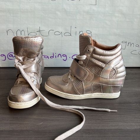 - Designer = Ash - Size = Eur 32. Trunk 37 - Msrp = $180 - Ash Light Champagne Color Leather Babe Bis Kid’s Size 32 Hidden Wedge Sneakers - Measured Underneath Outsole From Front Tip Of Shoes To Back Tip Of Heel To Give An Estimate Of Size Length = Approximately 20.5cm - Height Measured At Top Tip Of Sneakers To Bottom Tip Of Outsole = 13cm Trunk 37 Sneaker Heels Outfit, Stylist Closet, Heeled Sneakers, Colorful Wedges, Ash Sneakers, High Top Wedge Sneakers, Hidden Wedge Sneakers, Heel Sneakers, Ash Shoes