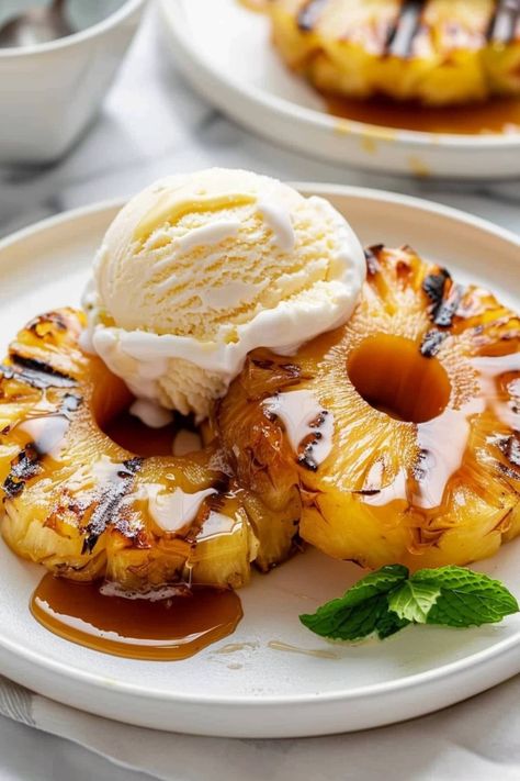 The next time you get a sweet craving, try this fantastic grilled pineapple. Serve it with a scoop of ice cream, and you'll want to lick the bowl clean! Pineapple Display Ideas, Pineapple Food Ideas, Ice Cream With Fruit, Grilled Pineapple Dessert, Pineapple Topping For Ice Cream, Grilled Pineapple Bowl, No Churn Pineapple Ice Cream, Pineapple Coconut Ice Cream, Pineapple Food