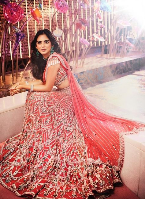 For her performance at the sangeet, she wore a coral Falguni and Shane Peacock lehenga. Bangladeshi Dress, Sangeet Lehenga, Isha Ambani, Falguni Shane Peacock, Radhika Merchant, Anant Ambani, South Indian Bride Saree, Sangeet Ceremony, Nita Ambani