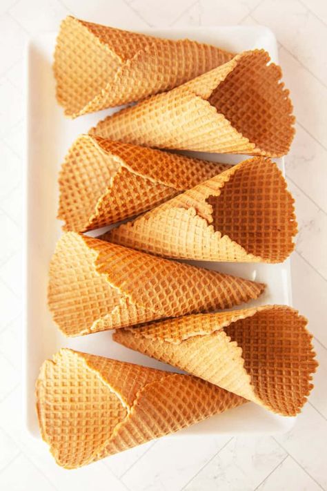 Homemade Waffle Cones are so delicious, easy to make, and perfect for serving up scoops of your favorite ice cream! No reason to go to an ice cream shop - you'll be making waffle cones at home before you know it! Homemade Waffle Cones, Homemade Ice Cream Cone, Ice Cream Cones Recipe, Homemade Waffle, Waffle Cone Recipe, Ice Cream Waffle Cone, How To Make Waffles, Easy Ice Cream Recipe, Amazing Chocolate Cake Recipe