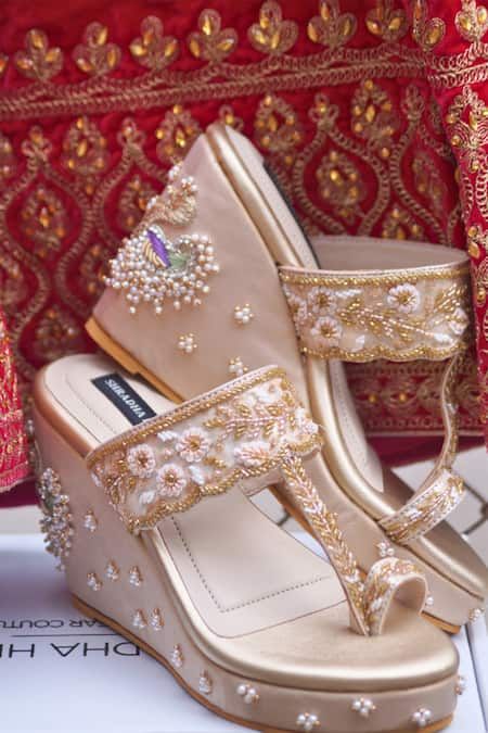 Buy Beige Cutdana Rohe Embriodered Wedges by Shradha Hedau Footwear Couture Online at Aza Fashions. Bridal Footwear Indian Wedding Shoes, Bridal Sandals Heels Indian, Bridal Heels Indian, Bridal Footwear Indian, Indian Heels, Wedding Crocs, Stylish Shoes Heels, Bridal Sandals Heels, Bridal Shoes Wedges