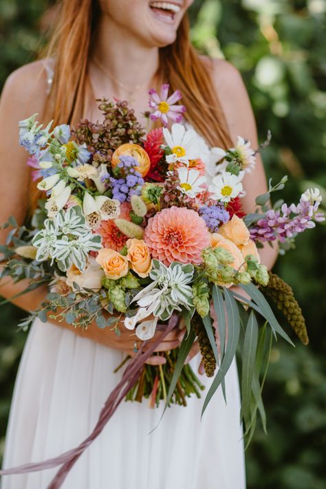 Summer wildflower bouquet made with all local blooms, like dahlias, cosmos, foxglove, and lupine. English Wildflower Bouquet, Fake Wildflower Wedding Bouquet, Summer Garden Bouquet, Summer Dahlia Bouquet, Meadow Bouquet Wedding, Boho Wedding Bouquet Wildflowers Rustic, Daisy Wildflower Bouquet, Dahlia Wildflower Bouquet, Forest Wedding Colors Palette Summer