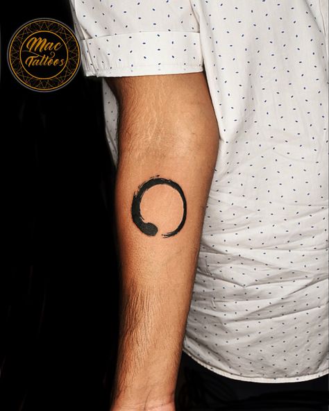 Enso is the Japanese word for the circle and a symbol closely related to Zen Buddhism. The enso symbolises absolute enlightenment, strength, elegance, the universe and the void . Inked at @mac_tattoos_original #hauzkhas For appointments do call or what’s app us on : +91 8851 012 863 +91 7042 130 654 Thanks for looking 😊 #ensotattoo #forearmtattoo #buddhatattoodesign #japanesetattoos #smalltattoosformen #delhitattoos #delhitattooshop #besttattooartistindelhi #besttattooindelhi Void Tattoo, Eastern Spirituality, Enso Tattoo, Buddha Tattoo Design, Universe Tattoo, Japanese Lacquerware, Japanese Word, Zen Buddhism, Small Tattoos For Guys