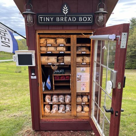 BAKED GOODS in a rural setting in Vernon, Vermont. Tiny Bread Box is a small-batch home bakery offering a variety of freshly baked goods from our automated self-serve farm stand every Saturday. About our Baked Goods Our bread is naturally leavened with a wild sourdough yeast culture and made using Tangzhong which produces a soft… Bread Display Ideas Farmers' Market, Self Serve Farm Egg Stand, Artisan Bread Packaging, Farm Stand With Fridge, Bakery Shed Tiny House, Microbakery Porch Pickup, Sourdough Vendor Booth, Micro Bakery Stand, Tiny House Bakery