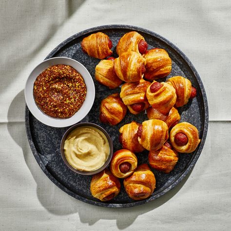 Easy Pigs in a Blanket Recipe | Bon Appétit Pigs In A Blanket Recipe, Pork Dinners, Smoked Cocktails, Sweet Potato Hummus, New Year's Eve Appetizers, Cocktail Sausages, Crescent Dough, Spicy Honey, Crescent Roll Dough