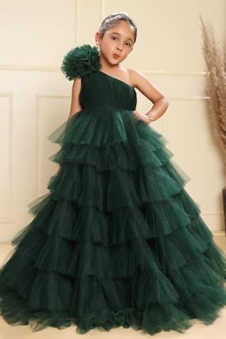 Bottle green fit and flare layered gown with floral applique on the shoulder. - Aza Fashions Satin Net Gown, Flare Dress For Kids, Layer Gown Pattern, Gown For Girls Party Wear, Gown Designs For Girls Kids, Baby Frocks Designs Party Wear, Net Frock Designs For Kids, Birthday Frocks For Kids, Net Frocks For Kids