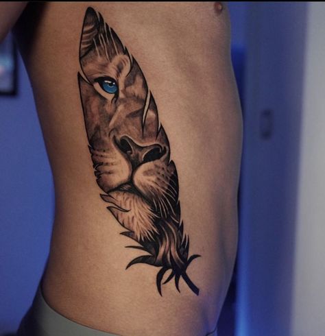 #ElegantTattoos #FineLineTattoo #ChicTattoos #ArtisticInk #SophisticatedTattoo #DelicateTattoo #MinimalistTattoo #ElegantInk #StylishTattoos #ElegantBodyArt Lion Face In Feather Tattoo, Lion In Feather Tattoo, Tiger Feather Tattoo, Lion Feather Tattoo Design, Lion With Feathers Tattoo, Feather Lion Tattoo, Lion Eyes Tattoo For Women, Lion Feather Tattoo, Wolf Feather Tattoo