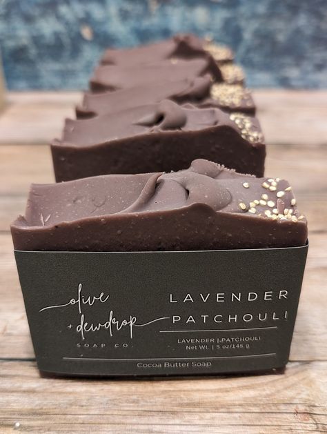 "LAVENDER PATCHOULI SOAP | COCOA BUTTER SOAP | COLD PROCESS SOAP BAR - 5 OZ Listing is for one (1) soap bar. Lather up with our LAVENDER PATCHOULI SOAP scented in a blend of Lavender and Patchouli essential oils. Made with plant-based oils and cocoa butter and formulated to gently cleanse without stripping your skin of its natural oils. -Suitable for all skin types -For external use only, discontinue use if irritation occurs. -For a longer lasting bar, allow soap to dry between uses. -Due to the nature of this handcrafted product, color and size may vary slightly between each batch.           Individual Soap Bar Dimensions: apx. 3.5\" wide, 2.5\" tall and 1.125\" deep      Individual Soap Bar Net Weight: approximately 5 oz.    Packaging:  Individual Soaps are packaged in a soap wrapper wit Artisan Soap Packaging, Soap Accessories, Bar Soap Packaging, Soap Packaging Diy, Artisanal Soap, Cold Process Soap Designs, Cocoa Butter Soap, Easy Soap Recipes, Patchouli Soap