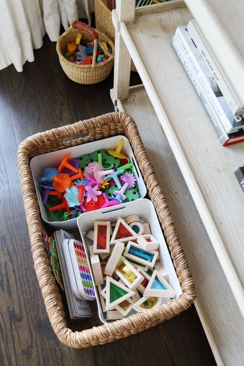 Our house has one living room that also functions as our family room. It was important to me that this room work for our whole family. That meant having a space that felt nice for adults, and one that had an area for my kids to play. Assuming that you don’t have a cabinet with closed doors, you’ll want to find storage that doesn’t look terrible. Basket Toy Storage Living Rooms, Toy Storage Basket, Minimal Playroom, Small Toy Storage, Creative Playroom, Toddler Toy Storage, Living Room Toy Storage, Playroom Organization Ideas, Toy Baskets