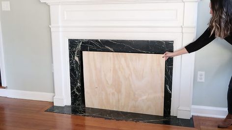 DIY Fireplace Cover Tutorial | eHow Covering Up A Fireplace, Fireplace Covers Diy, Covering A Fireplace Ideas, Cover Up Fireplace Ideas, Fireplace Cover Up Ideas Diy, Diy Fireplace Cover Ideas, Fireplace Cover Ideas, Diy Fireplace Cover, Covering Fireplace