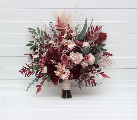 "The bouquet is made of flowers and leaves of high quality. Arch arrangement are here: https://www.etsy.com/listing/1611819480/burgundy-dusty-rose-blush-pink-arch?ref=listings_manager_grid All dimensions are total length or width. Size of the bridal bouquet : The width of the bouquet - 20\"( 50cm) The height of the bouquet - 23\" (58cm) The width of the bridesmaid bouquet- 10\" ( 25 cm) Thanks for visiting 😊" Rose Gold And Burgundy Wedding Flowers, Maroon And Pink Bouquet, Burgundy Blush Pink And Sage Green Wedding, Dusty Red Wedding, Burgundy Bride Bouquet, Wedding Bouquets For Fall, Wine Colored Flowers, Maroon Flowers Bouquet, Dust Rose Wedding