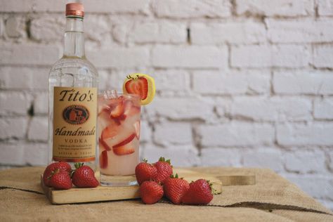 Tito's Strawberry Lemonade Recipe Tito’s Strawberry Lemonade, Strawberry Hennessy, Titos Vodka Recipes, Alcohol Ideas, Berry Lemonade, Alcoholic Punch Recipes, Strawberry Lemonade Recipe, Girly Drinks, Specialty Drinks