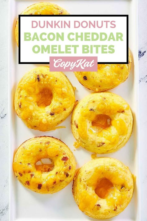 Dunkin Donuts Omelet Bites is a delicious breakfast of donut-shaped baked eggs with bacon and cheddar cheese. Get the easy copycat recipe and find out how to make the best omelet bites to start your day in a tasty way. Enjoy this tasty baked breakfast omelet anytime you have a craving. Donut Pan Recipe, Omelet Bites, Dunkin Donuts Recipe, Croissants Breakfast, Breakfast Omelet, Eggs With Bacon, Recipes Aesthetic, Donut Baking Pan, Veggie Bites