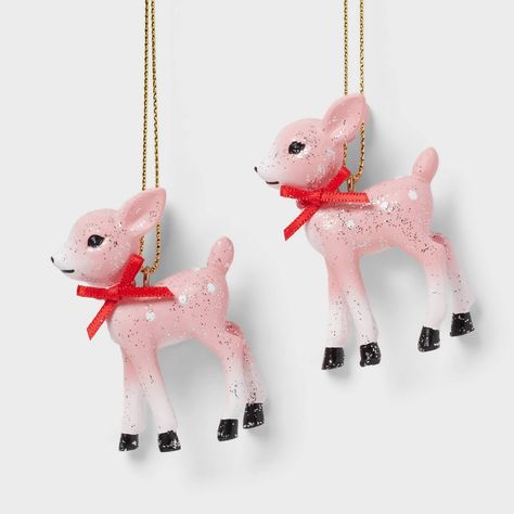 Add some forest friends to your holiday tree with this 2-Count Retro Small Deer Christmas Tree Ornaments from Wondershop™. This decorative ornament set includes two deer made of lightweight material. With a glitter finish, red scarves around their necks and black hooves, these small deer figures have a classically wintry look you'll love. They come with golden loops for easy hanging from a wall hook or your tree's branch. Wondershop™: Welcome to the Wondershop. Pink Vintage Christmas Decorations, Mid Century Modern Christmas Ornaments, Pink Retro Christmas, Mini Christmas Tree Ornaments, Retro Pink Christmas, Deer Christmas Tree, Pink Reindeer, Mcm Christmas, Small Deer