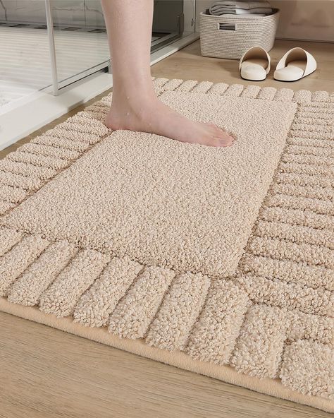 PRICES MAY VARY. 🛁 Excellent Softness & Absorbency: This bathroom mat features a high quality soft texture pile, which gives you a luxurious and comfy vibe when stepping on it. The adequate size is sufficient to cover the floor space, and it really absorbs excess water instantly, so your toes won't have to feel the cold floor as you step out of the shower or bathtub or stand in front of the sink. No more shivering on cold bathroom tiles! 🛁 Non Slip & Endurable Backing: The anti skid TRP backin Bath Rugs Ideas, Large Bath Rugs, Small Bathroom Rug, Shower Bathtub, Apartment Vibes, Moving Checklist, Beige Bathroom, Small Bath, Bathroom Tiles