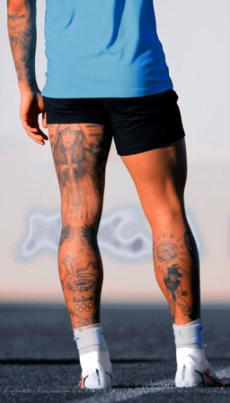 Explore 15+ thigh tattoos for men. Find inspiration for thigh tattoos, from small designs to unique ideas for guys. Elevate your style with attractive tattoos on the thighs. Soccer Calf Tattoo Men, Mens Tattoo Leg Sleeve, Tattoo On Legs For Men Ideas, Thigh Tats Men Simple, Back Of Leg Tattoos Men, Back Of Calf Tattoo Men, Soccer Tattoos For Men Leg, Back Leg Tattoo Men, Leg Tattoos For Men Calves