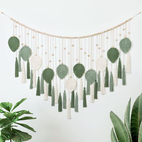 PRICES MAY VARY. Premium Quality: This meticulously knitted macrame wall decor with beautiful weaving leaves pattern is made of natural rope, with elegant tassels and wooden beads processed from natural wood. Reminder: The film on the back of the leaf is used to fix the shape, please do not tear it off. Package Includes: 1*large macrame wall hanging. In order to make it easier to hang this woven tapestry, we included 2 hooks in the package, and a comb was included that can be used to organize th Beaded Macrame Wall Hanging, Weaving Leaves, Macrame Wall Hanging Bedroom, Boho Bedroom Wall Decor, Macrame Wall Hanging Tutorial, Boho Macrame Wall Hanging, Macrame Headboard, Artsy Background, Living Room Apartment