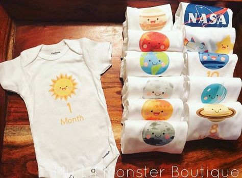 image 0 Milestone Onesies, Outer Space Baby Shower, Astronaut Baby, School Advertising, Monthly Onesies, Baby Wishlist, Space Themed Nursery, Neutral Baby Clothes, Space Baby