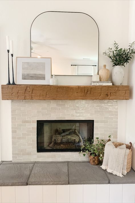 Fireplace Design for Spanish - Transitional home. Design by Room|ey & Co. Styling Fireplace Mantel With Mirror, Organic Modern Mantel Decor, Arched Mirror On Mantle, Arched Mirror Fireplace, Mirror For Over Fireplace, Mantle Below Tv Decor, Decorate Beside Fireplace, Mantel Decorating Ideas With Pictures, Mirror Over Mantle Decor