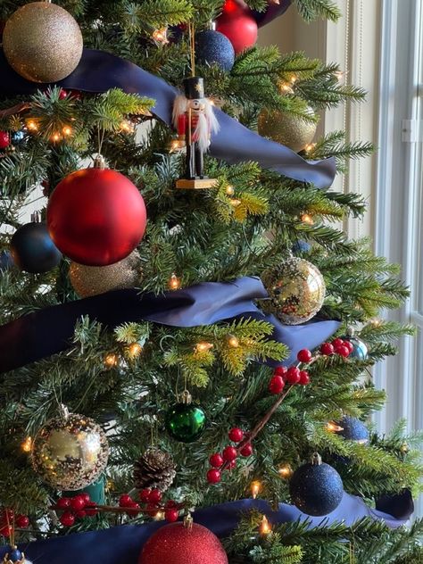 Navy Blue And Red Christmas Tree, Blue Red Gold Christmas Tree, Blue Red And Gold Christmas Tree, Red And Navy Christmas Tree, Red Green Blue Christmas Tree, Christmas Tree Blue And Red, Nutcracker Christmas Tree Ideas, Navy And Red Christmas Decor, Nutcracker Christmas Tree Theme