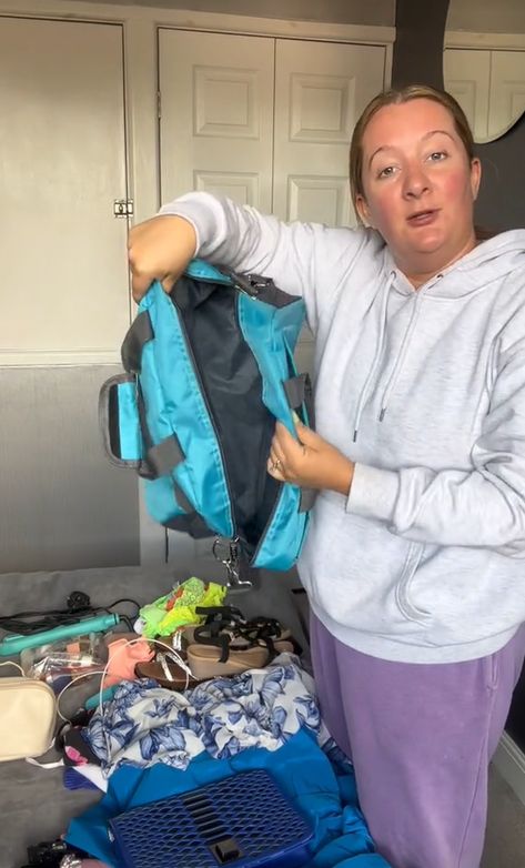 A WOMAN has revealed how she fits four days’ worth of clothes into a small carry-on bag to avoid extra luggage costs when flying with budget airlines. In a video on TikTok, one Ryanair passenger fitted her holiday items into a personal bag that most people would take to the gym. In the 90-second clip, Christina, who is […] Ryanair Carry On Packing Tips, Tiny Gym, Small Carry On Luggage, Hand Luggage Bag, Carry On Packing Tips, Hair Straightener And Curler, Carry On Packing, Holiday Clothes, Packing Clothes