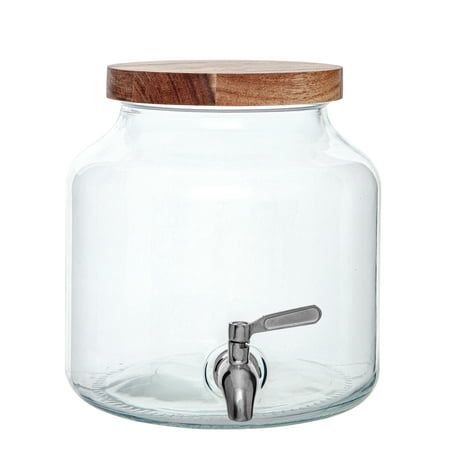 Better Homes & Gardens Clear Glass Beverage Dispenser, with capacity 1.5Gal, in size 8.35inL x 10.24inW x 8.85inH, to be excellent and make your summer more entertaining. Perfect for cold lemonade, water, juices, sangria. Dispenser is constructed of thick, premium grade, durable glass that ensures stability and balance when in use indoors or outdoors. Traditional pot shape make the dispenser vintage and natural feeling. Wood lid in luxury acacia material, with pretty natural wood grain, high valuable. The unique spigot is leak proof, non-drip, simple to use and provides a steady stream of liquid when tightened properly. #304 Stainless steel material is shiny and strong. Serve your favorite drinks indoors or outdoors! From casual picnics and barbecues, to formal dinner parties, this will su Clear Drink Dispenser, Sangria Dispenser, Hot Beverage Dispenser, Glass Water Dispenser, Lemonade Water, Coffee Dispenser, Glass Beverage Dispenser, Coffee Carafe, Beverage Dispenser