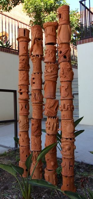 ceramic-totem-poles Clay Totems Ceramic Sculptures, Outdoor Clay Projects, Ceramic Totem Poles Garden Art, Ceramics Projects High School, Ceramic Totem Poles, Clay Totems, Clay Totem, Ceramic Totems, Ceramic Totem