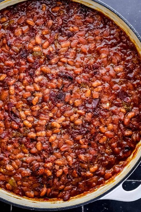 Southern Baked Beans are the perfect side dish recipe made with simple ingredients including canned beans, bacon, and a sweet and savory sauce. The best southern style recipe to share at family gatherings. simplylakita.com #bakedbeans Baked Beans For Bbq, Barbeque Baked Beans, Southern Style Baked Beans With Bacon, Hillbilly Beans Recipe, Thanksgiving Baked Beans, Candied Baked Beans, How To Dress Up Canned Baked Beans, Hillbilly Baked Beans, Million Dollar Baked Beans