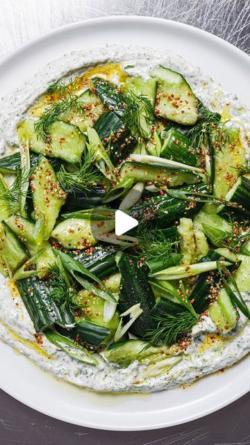 SO VEGAN on Instagram: "SMACKED CUCUMBER + TZATZIKI SALAD 🔥 get the full recipe with notes in the @sovegan App and via our website (follow the links in our bio) ✌️

We LOVE a smacked cucumber salad. Originating in China – smacked cucumber is traditionally combined with flavours such as sesame oil, soy sauce and chilli. Our version uses this technique - which tenderises the cucumber, making it absorb more delicious dressing - but combines it with homemade tzatziki flavours and a wholegrain mustard dressing for a fusion twist!

Serves 6

🌱 2 medium cucumbers
🌱 salt + pepper
🌱 olive oil
🌱 1 tbsp wholegrain mustard
🌱 1 lemon, juice only
🌱 1 tsp maple syrup
🌱 310g (1.25 cups) vegan yoghurt, see notes
🌱 1 garlic clove, peeled + grated
🌱 1 handful of fresh parsley, finely chopped
🌱 1 l Smacked Cucumber, Tzatziki Salad, Vegan Yoghurt, Garlic Juice, Homemade Tzatziki, Plant Based Cookbook, Cucumber Recipes, Garlic Clove, Mustard Dressing