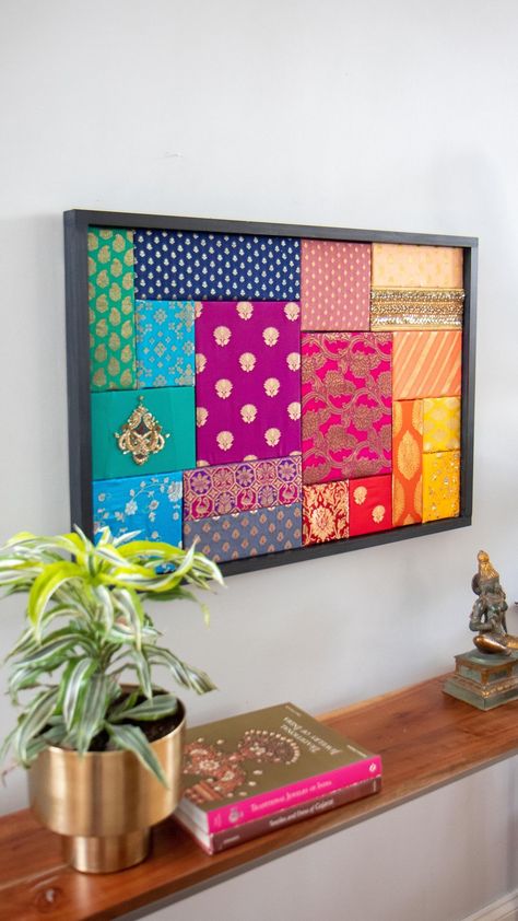 Mitesh | Home & Design | I’m a bit of a hoarder when it comes to fabric scraps always thinking I’ll use it for a project. From saree blouse piece remnants to old… | Instagram Cloth Framed Wall Art, Interior Canvas Painting, Fabric In Frames Wall Art, Wall Decor With Fabric, Saree Decoration Ideas On Wall, Indian Decoration Ideas House, Fabric Recycling Ideas, Fabric Wall Decor Diy, Wall Fabric Decor