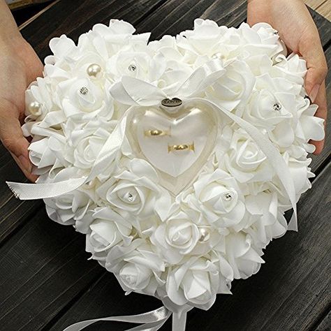 https://zenmerchandiser.com/shop/white-heart-shaped-floral-wedding-ring-pillow-ring-holder-box/ Pompon Tulle, Rose Wedding Rings, Rose Wedding Favors, Heart Ring Box, Ring Pillow Lace, Wedding Ring Cushion, Wedding Ring Bearer Pillow, Wedding Ring Shapes, Ring Pillows