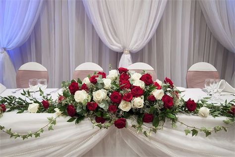 Red and Ivory Rose Top Table Spray Arrangement with Trailing Ivy and Pearls from Picture Perfect Events UK - Picture Perfect Events UK Bridal Table Flowers, Roses Arrangements, Red Roses Centerpieces, Top Table Flowers, Red Flower Arrangements, Head Table Wedding Decorations, Wedding Top Table, Red And White Weddings, Table Flower Arrangements