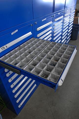 Plastic bins can be added to cabinet drawers, keeping small parts organized and separated. http://www.stanleyvidmar.com/see-it-work/image-galleries/automotive-parts Bolt Bin Ideas, Workshop Cabinets, Small Parts Storage, Parts Storage, Garage Atelier, Garage Storage Shelves, Cool Garages, Garage Tool Storage, Hardware Storage