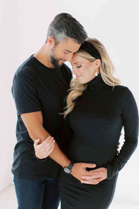 Maternity Poses For Couples, Maternity Shoot Poses Indoor, Maternity Pictures White Dress With Husband, Pregnant Couple Studio Photoshoot, Couple Maternity Poses At Home, Maternity Shoot Couples Outfit, Poses For Pregnant Couples, Couple Photoshoot Maternity, Maternity Couple Poses Indoor