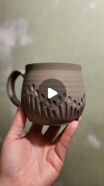 Aleatha Aiken-Sherrer on Instagram: "Carve a mug with me! 
This mug will be glazed in layers of colour that, if all goes to plan, will melt into the texture and break over the edges. 
.
.
Tools, just in case you're curious 😘
Loop tool by @dolantools
Carving tool by @diamondcoretools 
Stamp by 4clay.com
Hook/blade tool by @kempertoolschinoca 
.
.
.
#pottery #carving #clay #satisfying #gouge #dig #texture #ceramics #tools #Art #aleatha #aleathabean" Texture On Pottery Ideas, Carving Clay Ideas, Carving Pottery Mugs, Pottery Carving Tools, Carving Clay Ideas Patterns, Carved Pottery Mugs, Carving Pottery Ideas, Carved Pottery Ideas, Pottery Carving Ideas