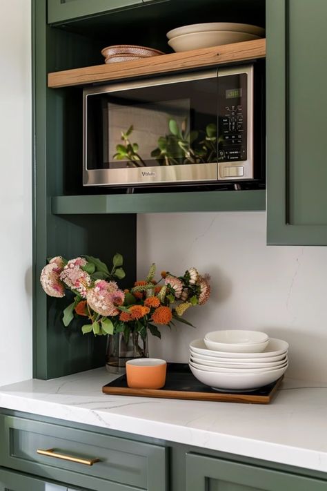 Transform your kitchen with stylish microwave wall shelf ideas that maximize space and reduce clutter. These creative designs allow you to keep your microwave off your countertops while adding a functional touch to your cooking area. Discover how a well-placed shelf not only frees up valuable counter space but also enhances the overall aesthetics of your kitchen. From minimalist wooden options to sleek metal designs, find inspiration to choose the perfect microwave shelf that complements your kitchen decor and fits your home style. Open Shelves Around Microwave, Wall Pantry With Microwave, Microwave Off Counter Ideas, Microwave Shelf Under Cabinet, Microwave Above Oven Ideas, Clever Places For Microwave, Kitchen Shelf For Microwave, Upper Cabinet Microwave, Kitchen Without Microwave