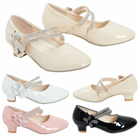 Excellent Quality Girls Mid Heels Very Cute Kids Heel Shoes Embellished Strap and Bow Side Detail Mid Heel Patent Finish Colours Available - Black, White, Pink, Beige Sizes Available - Kids Sizes Only ( 8, 9, 10, 11, 12, 13, 1, 2) Perfect For Bridesmaid, Wedding , Parties etc Any Queries Please Contact Us Bridesmaids Heels, Kids Heels, Girls High Heels, Quirky Fashion, New Cut, Bridesmaid Shoes, Wedding Parties, Bridesmaid Wedding, Black White Pink