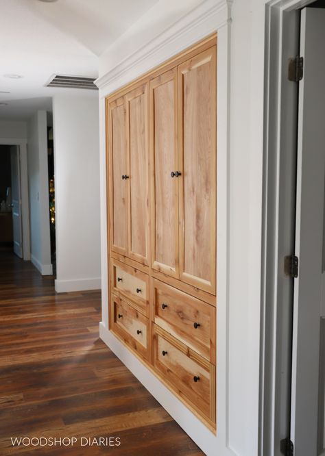 Learn how to turn a basic closet into custom built ins with this tutorial. Make your storage functional with hallway closet built ins. Built In Cabinet Closet, Replacing Closet With Built In, Hallway Closet Ideas Storage, Hall Built In Storage, Custom Built Closets Master Bedrooms, Closed Hallway Storage, Recessed Linen Closet, Closet Units Built Ins, Turn Closet Into Built In Pantry