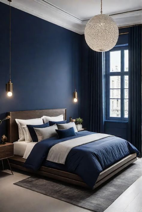 Modern bedroom with bold accent wall Bold Accent Wall, Moody Maximalist, Mobile Home Redo, Blue Accent Wall, Light Blue Throw Pillows, Bedroom Board, Indigo Walls, Grey Accent Wall, Blue Accent Walls