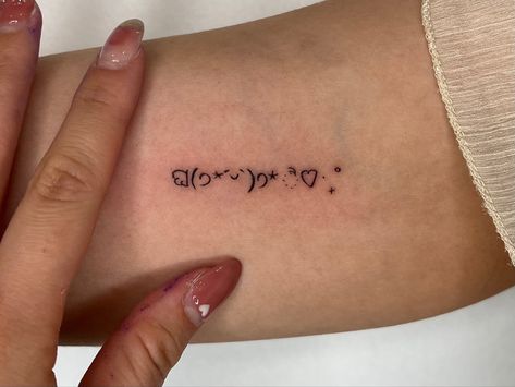 Emoji tattoo 
Tattoo
Emoji
Fineline tattoo Mini Tattoos Words, Emoticon Tattoo, Mochi Tattoo, Kaomoji Tattoo, Ascii Tattoo, Back To Middle School, Mini Tattoo Ideas, Emoji Tattoo, Tattoo Cute