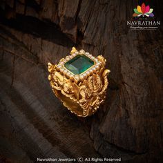 Ornamented with the majestic grandeur of an emerald the “King of Gems,” and embroidered with brilliant cut diamonds with exceptional sparkle, in opulent gold, it vibrantly flares a rainbow of flashes, producing a divine song that pulsates on your finger. Come walk into our stores now, aggrandize yourself with this handcrafted Nakaash Shiva Parvathi Emerald Diamond Ring, and take it away with you before it goes off the shelf or visit us at www.navrathan.com and get it immediately.#Jewellery Heavy Gold Ring For Men, Rings For Men Gold Unique, Pearl Rings For Men, Antique Mens Rings Gold, Mens Finger Rings Gold, Men Gold Ring Design Indian, Gold Rings For Men Unique, Mens Ring Designs Gold, Gold Ring Designs For Men