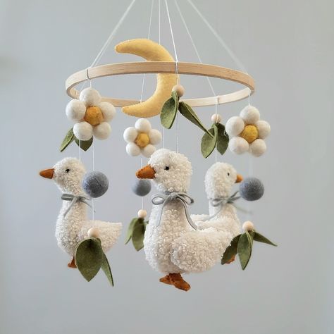 Mobile production time is 3-5 working days. Delivery within 3-4 weeks. Handmade crib mobile The height of the mobile phone from the top to the bottom is 17.7-18.9 inches (45-48 cm). Base diameter is 7.87 inches (20 cm). Materials: felt, holofiber, boucle fabric IMPORTANT! The crib holder and music unit are not included in the price of the mobile. The color of your mobile phone may differ slightly from what appears on your monitor. You can track your parcel using the track code, which you will re Mobile Over Crib, Farm Animal Mobile, Goose Baby Nursery, Compactum Nursery, Duck Theme Nursery, Goose Mobile, Frog Nursery, Handmade Crib, Felt Baby Mobile