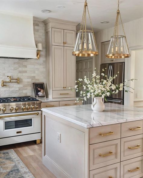 Entryway To Kitchen Transition, Large Kitchen Pendants, Khaki Kitchen Cabinets, Trending Kitchens 2024, Gold Accent Kitchen, New England Kitchen Design, Florida Kitchen, Kitchen Renovation Inspiration, Neutral Kitchen