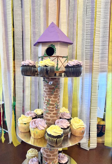 Tangled themed cupcake tower for tangled birthday party! SO EASY to make! All you need is 3 cake plates, two pringles cans and a wooden bird house, found at Walmart for $6. You can totally customize it and paint it to be whatever themed you want!! Rapunzel Cupcake Tower, Rapunzel Tower Cake, Tangled Cupcakes, Rapunzel Cupcakes, Tangled Tower, Rapunzel Tower, Rapunzel Birthday, Rapunzel Birthday Party, Cake Tower