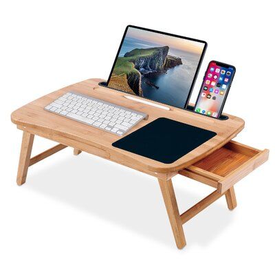 The Laptop Bed Tray is a great addition to any bed, sofa, or chair. The tray allows you to eat or work on your laptop from the comfort of your bed. Great for working from home. Once you're finished working, store your pens or computer mouse in the convenient storage drawer. The bed tray with legs pulled out, allowing you to turn your regular desk, kitchen table, or kitchen counter into a standing desk giving you the healthy benefits without needing to buy another desk. Once your done standing, y Bed Desk Tray, Portable Standing Desk, Laptop Desk For Bed, Desk Kitchen, Amazon Christmas, Laptop Tray, Woodwork Projects, Woodworking Storage, Lap Tray