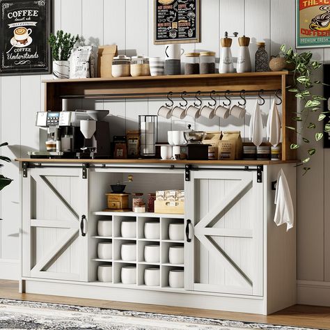 PRICES MAY VARY. 【Farmhouse & Classical Coffee Bar Cabinet】This Farmhouse Coffee Bar Cabinet combines dark wood grain panels with white cabinetry, 2 symmetrical fan-shaped sliding barn doors add beauty, and the overall delicate and elegant white tone is embellished with black metal pull accessories, bringing a unique farmhouse style to your home décor. 【Ample Space Hutch Cabinet】Measuring 15.75 "D x 55 "W x 50 "H, this Farmhouse Coffee Bar Cabinet has more storage space than traditional coffee b White Coffee Bar, Bar Sideboard, Kitchen Hutch Cabinet, Working Station, Coffee Bar Cabinet, Cabinet With Storage, Farmhouse Coffee Bar, Hutch Cabinet, Farmhouse Cabinets